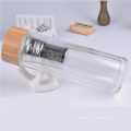 Bouteille en verre avec couvercle en bambou LOGO personnalisé avec infuseur à thé bouteille d&#39;eau en verre à double paroi
